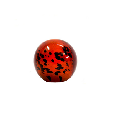 PARDOSIA BALL - Experience the magic of the Pardosia 9cm glass ball. Its stunning deep amber color and dark animal-like markings make it a mysterious addition to any collection. With a 9cm diameter and 28cm circumference, this ball is the perfect size for display.UNIQUE INTERIORS.