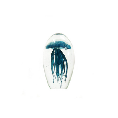Expertly crafted, the Palau 12cm is a stunning piece that stands at 12.5cm in height. Its 8cm diameter and 23cm circumference, handmade with heavy and clear glass, encases a captivating peacock blue jellyfish shape with intricate tentacles. A beautiful and unique addition to any space.UNIQUE INTERIORS.