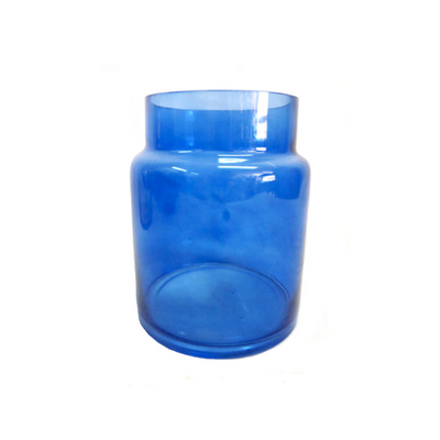 The Blue Mystic Jar features a 15CMD x 18.5CMH glass jar in a stunning blue color. Perfect for displaying on a shelf, this jar's impact is undeniable. Crafted with precision and style, this jar is a must-have for any home.UNIQUE INTERIORS.