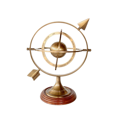 Looking for a unique piece in your study? Then the armillary with arrow is the answer.   The contemporary sundial usually has three rings that form the sphere. These are supposed to represent, the Celestial Equator, the Meridian Circle, and the Horizontal Plane. The rod passing through the center, frequently depicted as an arrow, acts as the gnomon and casts the shadow over the hours on the lower band.  Size:  24X19cm  Delivery   7 - 10 working days