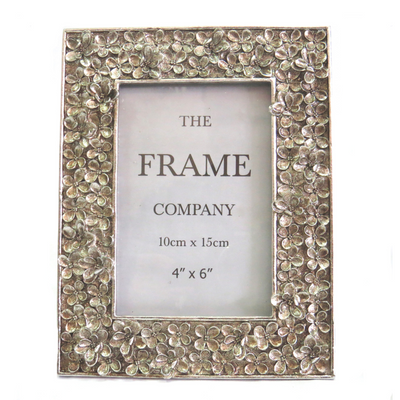 Introducing our Portfolio Frame, designed with precise measurements to perfectly showcase your 4" x 6" or 10cm x 15cm photos or pictures. The sleek silver frame, weighing only 490gms, measures 17cm x 22cm, making it a versatile and lightweight addition to any space-unique interiors