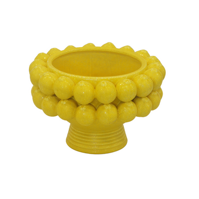 Elevate your serving experience with our Ceramic Lemon Pedestal Bowl. Standing at 24cm tall and 36cm in diameter, this bright yellow bowl adds a pop of color to any table setting. The perfect size for holding fruits or displaying desserts, it's both functional and stylish-UNIQUE INTERIORS