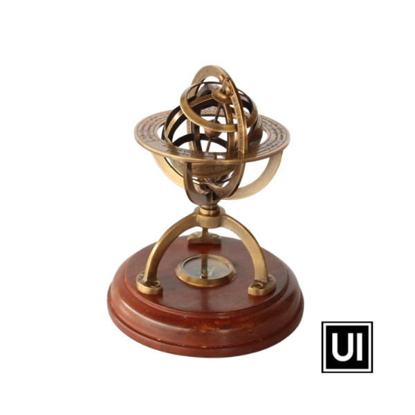 Small brass armillary star sign and compass