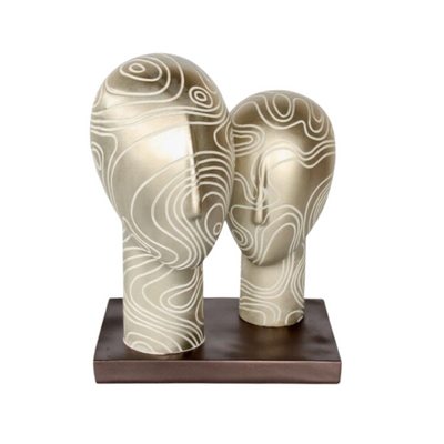 This product is perfect for those who appreciate unique and eye-catching decor pieces. The two silver heads on a stand add a touch of sophistication to any room,  construction ensures durability and longevity. This product is versatile and can be used in a variety of settings, including living rooms, bedrooms, and offices