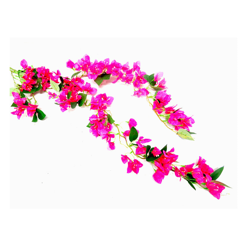Bouganvillia Cascade boasts a full length of 120cm, showcasing a stunning cascade of bright pink blooms. Its elegant draping effect adds a touch of beauty to any space, making it the perfect addition to your home or garden- UNIQUE INTERIORS