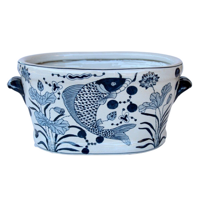 Updated for stylish, contemporary looks, this Blue Fish Footbath is crafted from ceramic for lasting durability. Measuring 22x47x28cm, it's the perfect size to hold your favorite potted plants indoors or out. Enjoy a modern, practical décor solution with this attractive, unique piece.