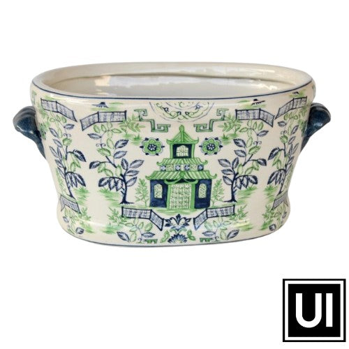This Blue & Green Pagoda Foot Bath planter brings a classic, decorative touch to any outdoor living space. Crafted from ceramic, it&