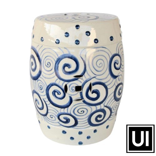 This beautiful ceramic garden stool with its blue and white circle pattern adds a unique touch of elegance to any outdoor or indoor space. Crafted from durable ceramic, this piece can stand up to the elements with ease and provides 43x30cm of seating space.  Unique Interiors lifestyle
