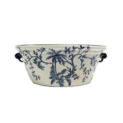 Lovely design in hand painted blue and white foot bath. Oval container ideal for orchids or any other flowers or wonderful filled with lemons to create a Monet moment. UNIQUE INTERIORS .