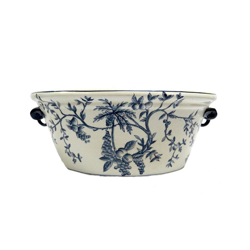 Lovely design in hand painted blue and white foot bath. Oval container ideal for orchids or any other flowers or wonderful filled with lemons to create a Monet moment. UNIQUE INTERIORS .