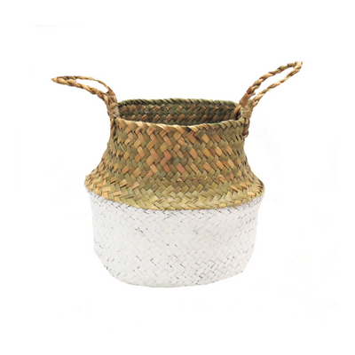 Crafted from natural seagrass and painted white from the widest section of the basket down, this gorgeously woven plant holder is conveniently collapsible into a round shape for easy carrying. Featuring twined natural handles, this practical yet aesthetically pleasing accessory will make any plant look fantastic- UNIQUE INTERIORS