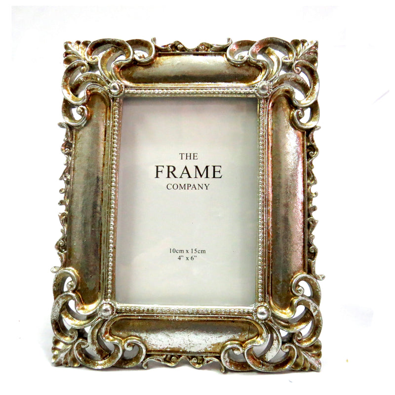 Display your cherished memories in style with our St Silver Frame. The stunning antique silver design features intricate corner detailing and can hold a 4″ X 6″ or 10CM X 15CM photo. Elevate your home decor with this elegant and unique frame-unique interiors