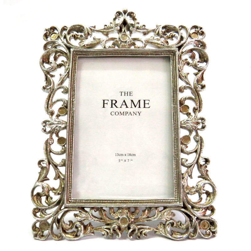Introducing the Napoli Frame, expertly designed to showcase your favorite 4" x 6" photos. Crafted with style and quality, this frame is perfect for displaying your cherished memories in any room. With clean lines and a sophisticated design, the Napoli Frame is the perfect addition to your home decor-unique interiors