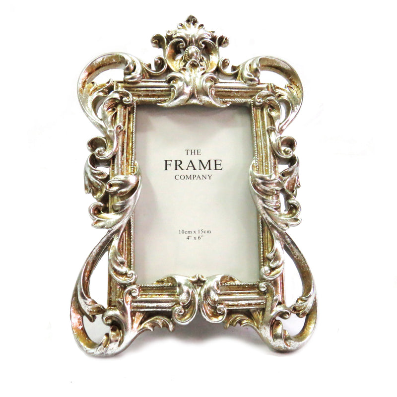 The Victora Frame features a silvery gold color and can hold a 4" x 6" photo. Made with high-quality materials, this frame adds a touch of elegance to any home decor. Preserve your memories with this beautiful and durable frame-unique interiors