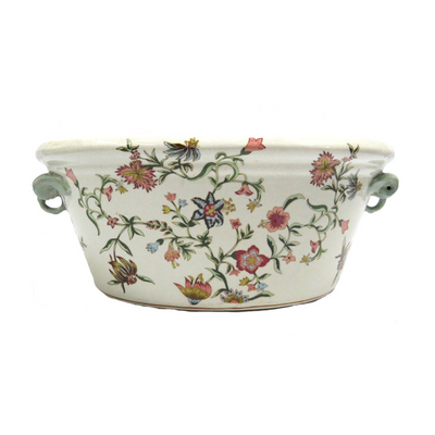 Clementine footbath is crafted with a delicate, soft floral design painted on porcelain. This oval-shaped footbath is undeniably beautiful. UNIQUE INTERIORS.