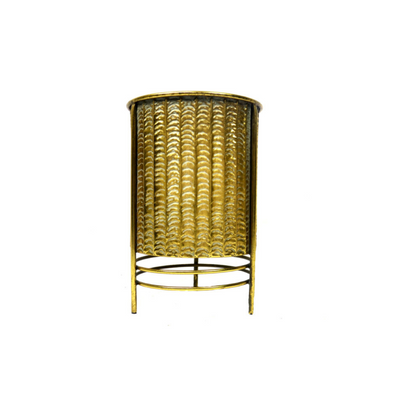 The Ballister Pot is the perfect addition to your home decor. With a 26cm opening size and 40cm height, this antique gold container stands out as the most interesting piece in any room. The attached metal surround with legs lifts the pot off the surface, creating a unique and eye-catching display. Add both style and functionality to your space with this one-of-a-kind poUNIQUE INTERIORS.