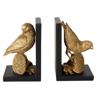 GOLD LOVE BIRDS PAIR OF BOOKENDS 18X11.5CM    Add a touch of elegance to your bookshelf with our Gold Love Birds Pair of Bookends. Standing at 18x11.5 cm, these stunning bookends featuring intricately designed love birds will keep your books organized while adding a decorative touch to your space. Crafted from premium quality materials, they are both functional and visually appealing.  Delivery fee 5 to 7 working days