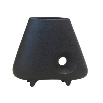 CERAMIC HOLE VASE BLACK (28CM (H) X 32CM) Introduce the unique and elegant CERAMIC HOLE VASE BLACK. Made from high-quality ceramic, this vase features a modern design with a diameter of 32cm and a height of 28cm. Its sleek and minimalist design adds a touch of sophistication to any room. Perfect for displaying your favorite flowers, this vase is a must-have for any home decor.  Delivery 5 to 7 working days   