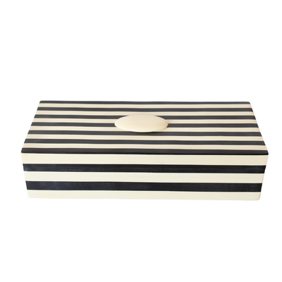 BLACK & BONE OBLONG BOX 30.5X8CM This BLACK & BONE OBLONG BOX 30.5X8CM is a stylish and modern storage solution for your home. With its sleek black and white design, this box will easily blend in with any home decor. Its 30.5X8CM size makes it perfect for organizing small items, keeping your space clutter-free.     Delivery 5 to 7 working days