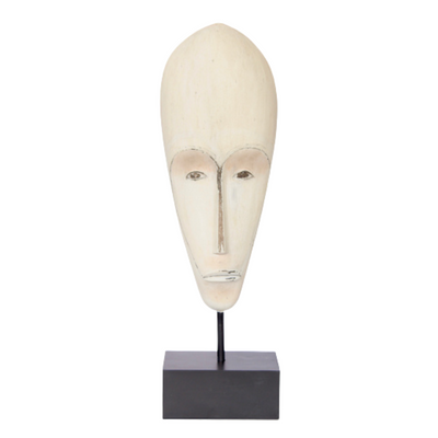 LARGE CREAM RESIN MASK ON STAND 81X24X15CM Expertly handcrafted, this stunning large cream resin mask is a masterful addition to any decor. Standing at 81x24x15cm, this luxurious piece is both eye-catching and elegant. Perfect for adding a touch of exotic flair to your home or office space.  Delivery fee 5 to 7 working days