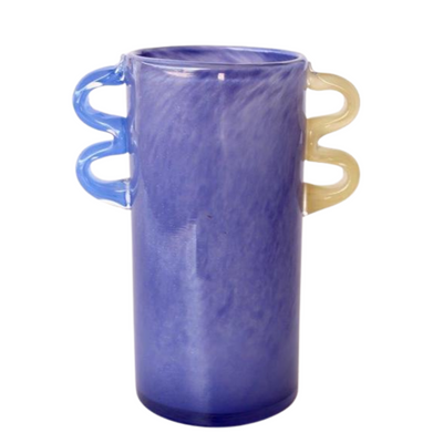 PURPLE GLASS VASE BLUE, YELLOW HANDLES 25X20X12.5CM Introduce a pop of color to your space with our Purple Glass Vase. The striking blue and yellow handles add a unique touch to this 25x20x12.5cm vase. Made from high-quality glass, this vase will showcase your floral arrangements beautifully. Elevate your home decor with this stylish and functional piece.  DELIVERY 5 to 7 working