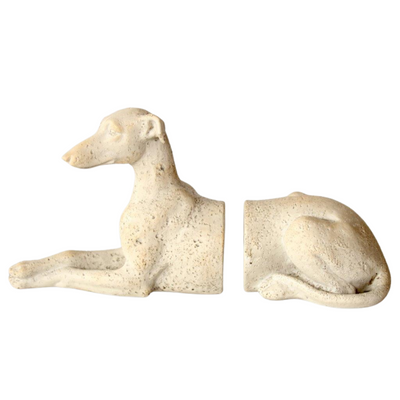 PAIR OF OFF WHITE WHIPPET BOOKENDS 16X30X9CM Enhance your home decor with this stylish and functional pair of off-white Whippet bookends. Featuring a sleek and elegant design, these bookends add a touch of sophistication to any bookshelf or desk. Made of high-quality materials, they provide sturdy support for your books while also serving as a decorative piece. Elevate your space with these 16x30x9cm bookends.  Delivery fee 5 to 7 working days