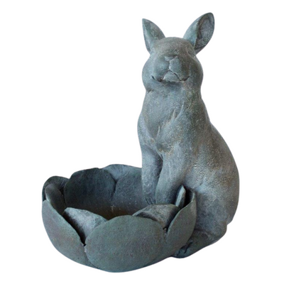 GREEN RABBIT WITH FLOWER POT 27X24X17CM Discover a charming addition to your garden with our GREEN RABBIT WITH FLOWER POT 27X24X17CM. Made with high quality materials, this adorable rabbit statue adds a touch of whimsy to any outdoor space. Its vibrant green color and intricate detailing make it a perfect statement piece for your garden.  Delivery fee 5 to 7 working days