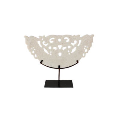 This large white cut out sandstone on metal stand will add a touch of elegance to any space. Made with high-quality sandstone and sturdy metal, this stand is durable and versatile. Perfect for displaying plants, statues, or other decor, this piece will elevate the look of any room.UNIQUE INTERIORS.