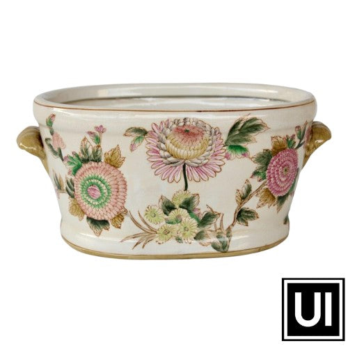 Large pink flower large footbath 20x41x26cm  This Large Pink Flower Footbath is perfect for creating a vibrant and stylish potting display. Durably crafted from ceramic and featuring a striking pink flower design, it measures 20x41x26cm and is an impressive addition to any space.  Unique Interiors, a place where you can find trendy decor that stays forever in style for any style.