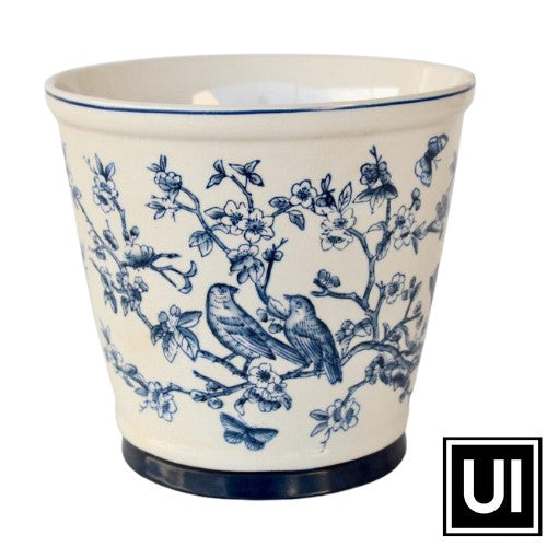 This Large Blue Round Bird Planter is the perfect addition to any garden. At 22x23.5cm, it features sturdy ceramic construction and a classic blue finish to bring a touch of nature to your outdoor space. This planter is sure to brighten up your garden for years to come.  Unique Interiors 