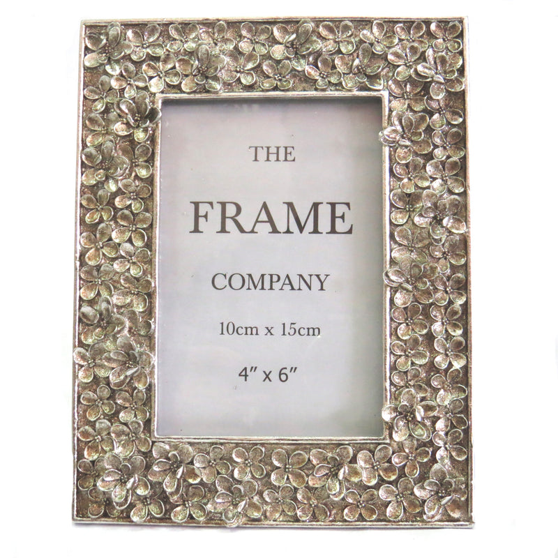 Introducing our Portfolio Frame, designed with precise measurements to perfectly showcase your 4" x 6" or 10cm x 15cm photos or pictures. The sleek silver frame, weighing only 490gms, measures 17cm x 22cm, making it a versatile and lightweight addition to any space-unique interiors