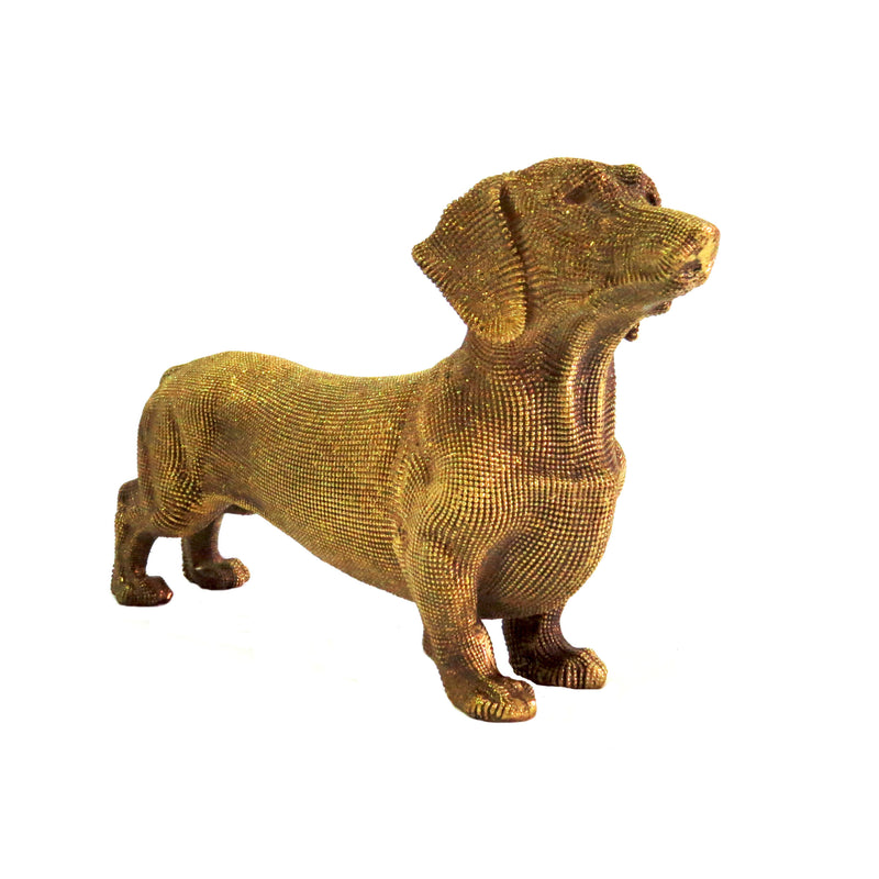 Discover the unique and stylish Leopoldina Sausage Dog. This gold-colored, 24.5cm long and 14.5cm tall item will bring a charming touch to any room. Weighing 310gms, this item is a must-have for any sausage dog lover looking for a statement piece in their home-unique interiors