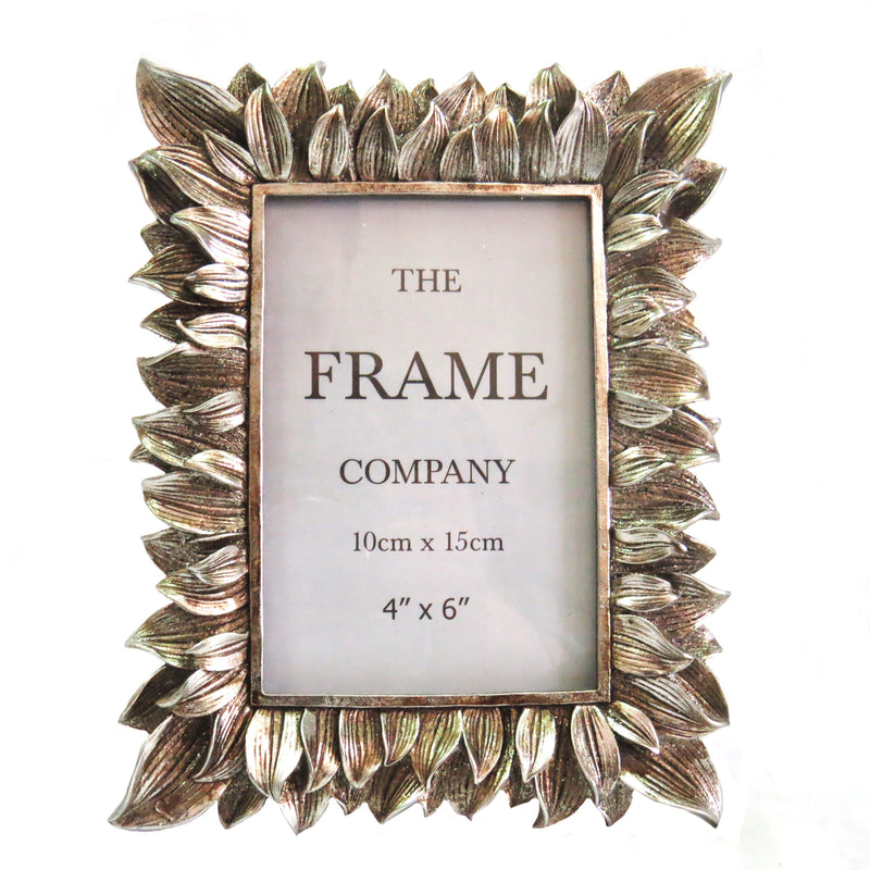 The Petals Frame is the perfect way to showcase your cherished memories. With an opening of 4" x 6" or 10cm x 15cm, it accommodates standard photo sizes. Its sleek design, measuring 18cm x 22.2cm, makes for a lightweight and elegant addition to any room. Crafted in silver, this frame weighs 540g for a secure and polished display-unique interiors