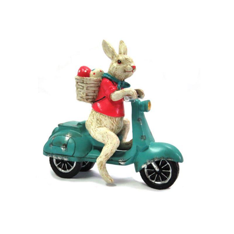 Introducing the Vespa Rabbit - a stunning, handcrafted piece of art. Expertly painted and detailed, this rabbit on a vespa is made from solid resin and measures 17.5cm x 7cm x 18cm. A must-have for any collector, this unique creation is sure to bring joy and style to any space.UNQIQUE INTERIORS.