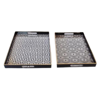SET OF 2 BLACK & WHITE TRAYS 4X48X35CM Unique Interiors Size 46X15CM Delivery 5 to 7 working days These trays offer perfect symmetry and style, plus they're designed to last with durable and lightweight materials. With a delivery time of just 5-7 days, you'll be able to enjoy them in no time.
