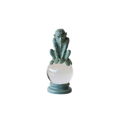 Add a unique touch to your living space with a captivating Green monkey on crystal ball. This stunning piece is 25X10.5cm, making it the perfect size to be eye-catching while fitting any room. Enjoy the mix of modern and classic that this piece offers.     Delivery 5 - 7 working days