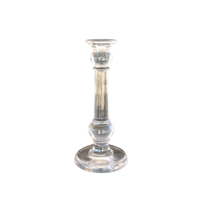 Medium heavy glass candle stick 35X16cm  This medium heavy glass candle stick is 35x16cm. With its weight and size, it's perfect for creating a beautiful and elegant atmosphere. The solid glass construction ensures reliability and longevity, making it a dependable addition to any home or event.  Delivery 5 - 7 working days