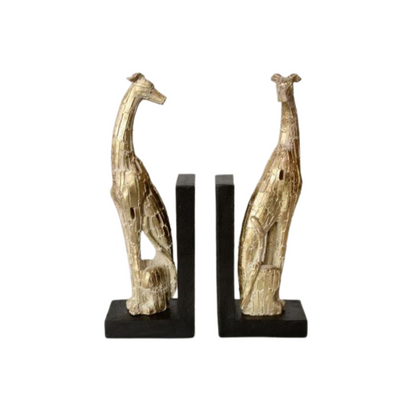 Pair of dog bookends champagne colour 30X21.5CM  This striking pair of champagne-colored dog bookends is crafted from durable resin and measures 30 X 21.5cm. Each lifelike canine design adds a unique and distinguished touch to any bookshelf. Perfect for adding a touch of personality to your home library.  Delivery 5 - 7 working days