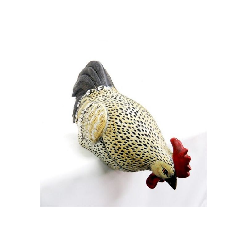 Experience the beauty of nature with our Buffy Rooster This bird is sure to be a stunning addition to any home. The hen is perfect for both traditional and more modern spaces. Our Buffy Rooster is a perfect way to bring a bit of the outdoors inside.UNIQUE INTERIORS.
