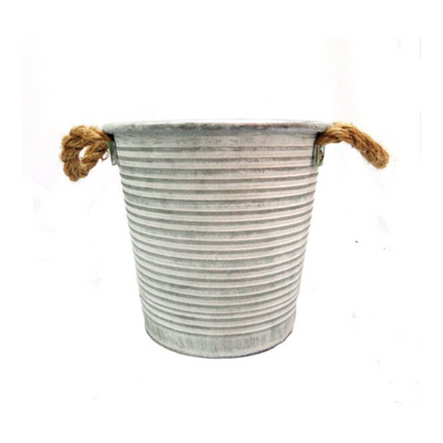 Elevate your home decor with the vintage charm of Somerset Bucket. This versatile antique pot is perfect for both indoor and outdoor use, allowing you to add a touch of history and style to any space. With its spacious 21.5cm x 16cm x 20cm size, it's easy to create elegant arrangements of your favorite flowers and foliage. UNIQUE INTERIORS