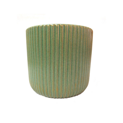 The Jasper Pot, measuring 16cm x 15cm, is the perfect addition to your home decor. Featuring a gorgeous new finish in a modern green color, this pot adds a touch of elegance to any room. With its compact size and eye-catching design, it's an ideal choice for plants or storage. UNIQUE INTERIORS