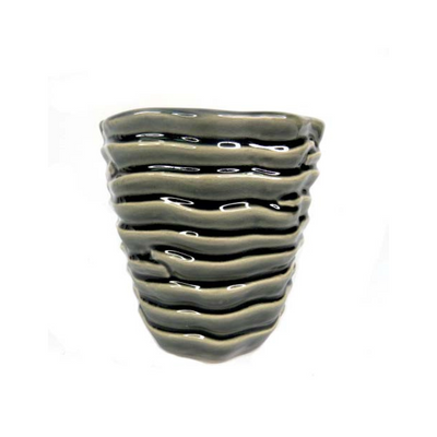 Expertly crafted, the Granito Pot is the perfect addition to any garden or home. With its durable design and measurements of 14.5cm in diameter and 15cm in height, this planter is the ideal choice for showcasing your plants. Elevate your gardening game with this must-have accessory.UNIQUE INTERIORS.
