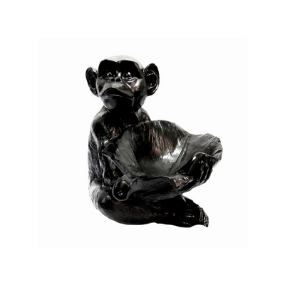 Add a touch of playfulness and elegance to your home with the stunning Monkey Obsidi. This black monkey decor piece, measuring 33 x 28 x 30, is crafted with intricate details, making it a unique and eye-catching addition to any room. Sure to be a conversation starter, this sitting monkey statue is a must-have for any decor collection.Unique Interiors