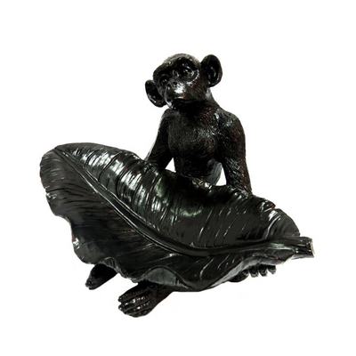 Add a hint of whimsy and sophistication to your living space with the impressive Monkey Ebony. This decor piece, measuring 20 X 30 X 22 inches, features intricate details, making it a one-of-a-kind and attention-grabbing addition to any room. As a conversation starter, this seated monkey sculpture is essential for any decor enthusiast.UNIQUE INTERIORS.