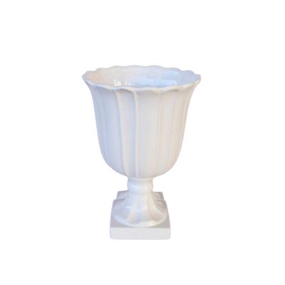 This medium-sized white vase or urn, measuring at 35X24CM, is versatile and elegant. Perfect for displaying flowers or as a stand-alone piece, it adds a touch of sophistication to any room. Crafted with high-quality materials, it is durable and timeless. <span style="font-size: 0.875rem;">Display your favorite flowers or use it as a standalone statement piece. The possibilities are endless. Unique Interiors