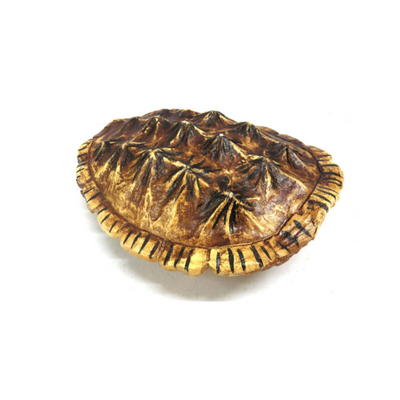 Crafted with exceptional beauty and precision, the Balboa Tortoise is the perfect addition to elevate your home decor. Its striking tortoise shell design will make a statement on any table or wall. Bring a touch of sophistication to your space with this exquisite piece.UNIQUE INTERIORS.