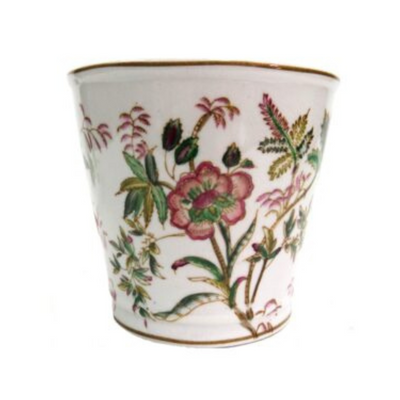 This beautifully designed floral planter, measuring 17cmd x 15.5cmh, showcases intricate hand-painted details. Add a touch of elegance to your space with this special item. UNIQUE INTERIORS