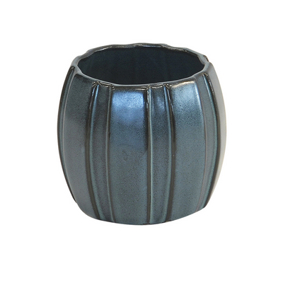 This small ceramic cone vase offers a unique look for any interior. It stands 12CM high and is 11CM in diameter. Made of ceramic porcelain, this decor pot is a stylish addition to any room.  Ceramic cone vase blue small  Size  12CM (H) X 11CM (D)  Ceramic porcelain decor planter pot.  Unique Interiors