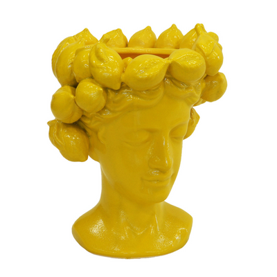 Ceramic head vase in lemon yellow measures 30cm (H) x 23cm x 25cm, crafted with ceramic porcelain for a unique interior decor.  Ceramic head vase lemon yellow  Size  30CM (H) X 23CM X 25CM  Ceramic porcelain decor planter pot.  Unique Interiors