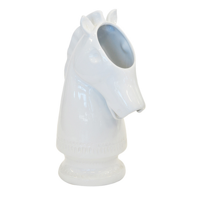 This white ceramic horse bust is sure to be the highlight of any room. At 46cm high and 30cm by 20cm in size, this bust is the perfect size to make a statement while not taking up too much space. Crafted from ceramic, this bust is sure to withstand the test of time, making it a timeless addition to your home.  Ceramic horse bust white   Size  46CM (H) X 30CM X 20CM  Unique Interiors 